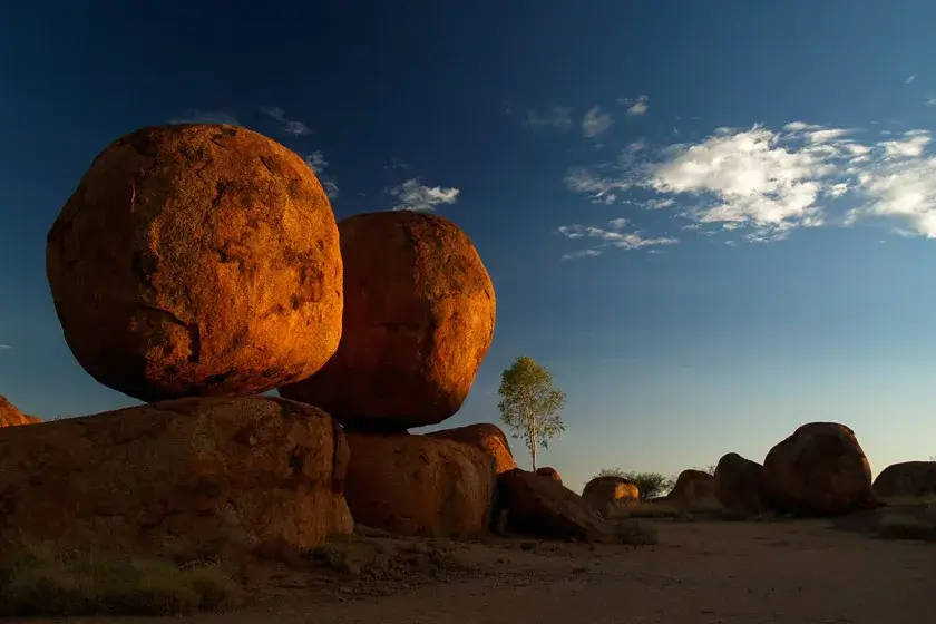 Devils Marbles glowing orange at sunset in the Northern Territory